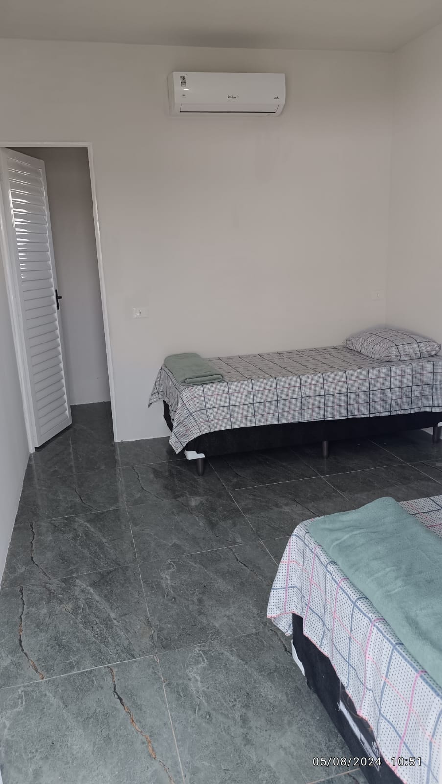 Quarto com ar‑condicionado
